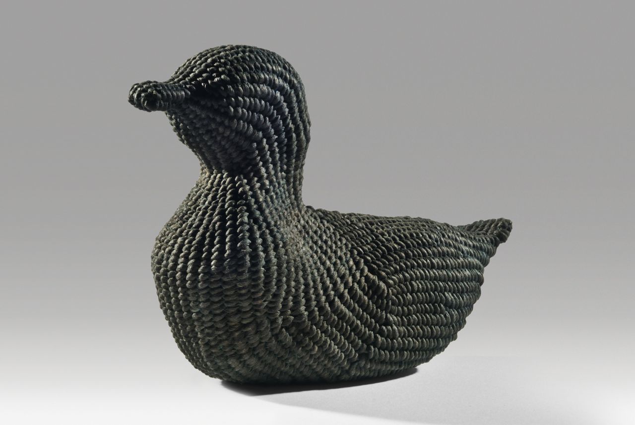 Midnight duck (2015). Walnut ink, indigo, corded and twined hanji. 5" high, 7.5" long. Private collection.