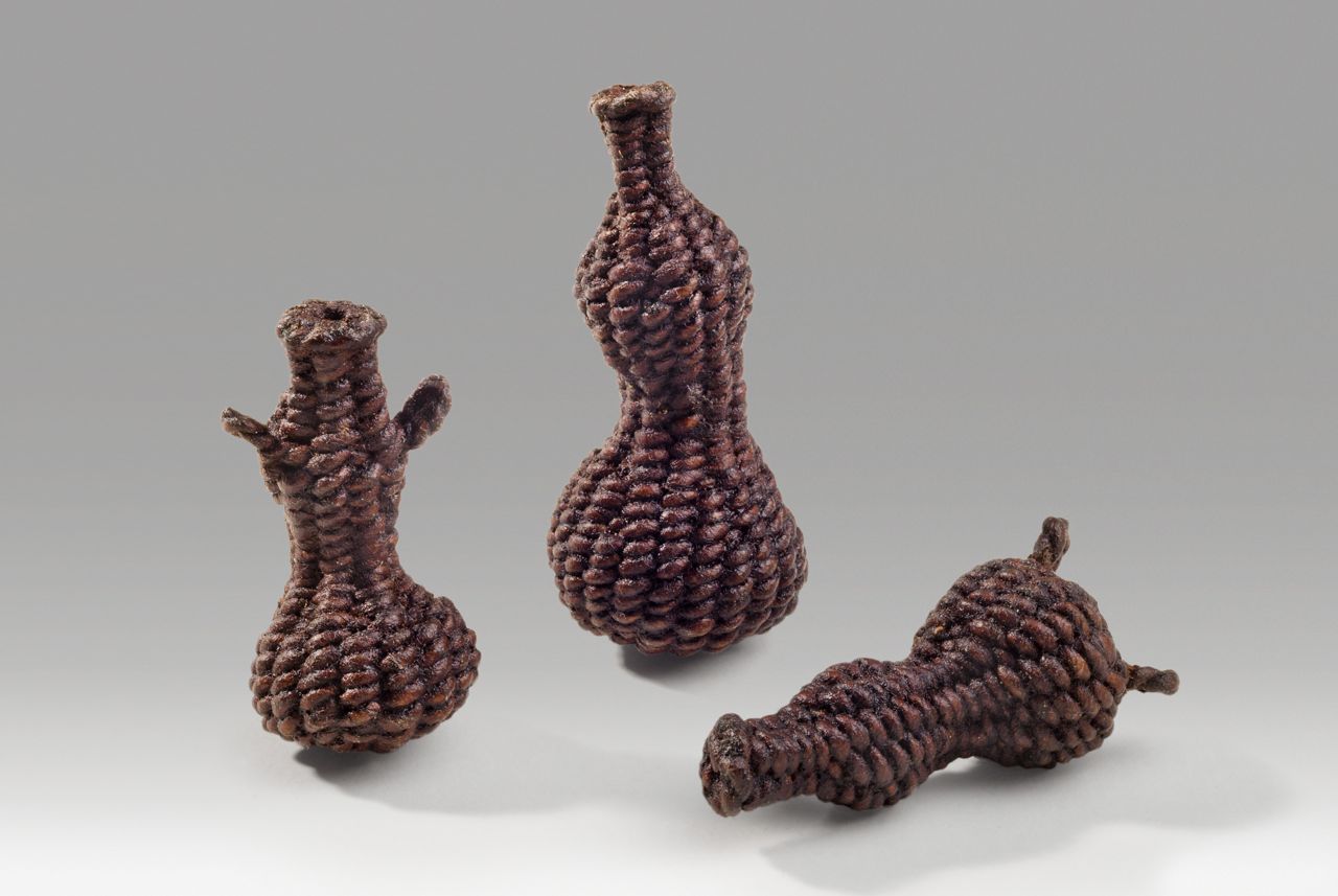 Miniature gourds (2014). Lacquer on hanji. 1.75", 2.5", and 2" tall.
