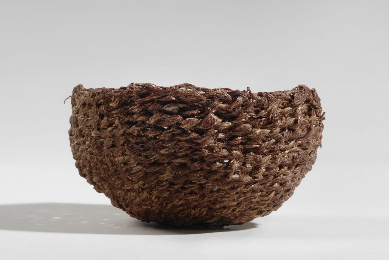 Bark basket (2010). Persimmon juice on mulberry bark. 3” dia, 2” high. Private collection.
