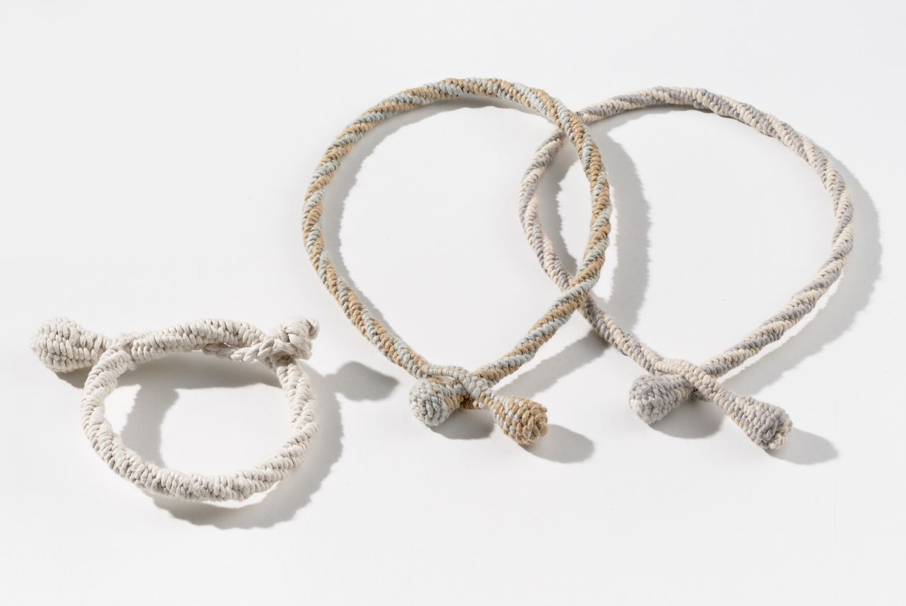Jewelry (2009). Hanji, persimmon, indigo, and clove dyes; 13" bracelet, 19" necklaces.