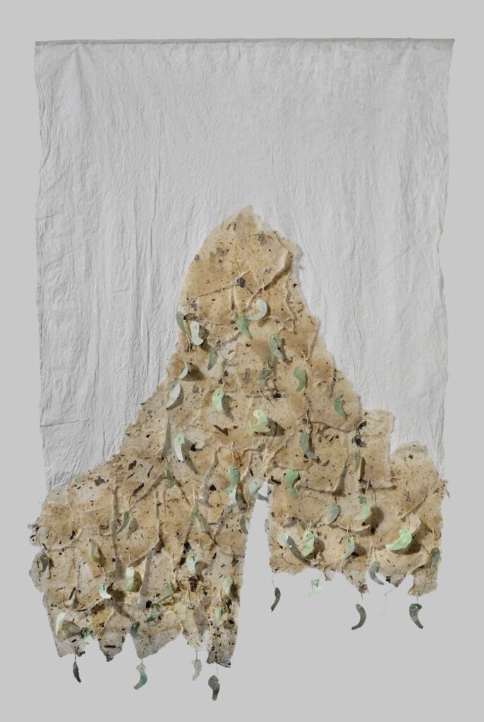 Jeweled mountain (2010). Beeswax on bark hanji, bark thread, gouache on hanji. 33.5 x 22”.