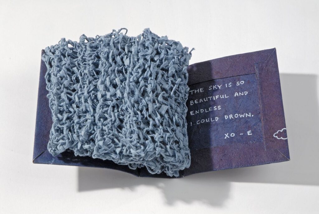 Chapter Sixteen (2009). Spun and knit hanji, pen on indigo-dyed handmade cotton/hemp/cattail paper. 4.75 x 4 x 2