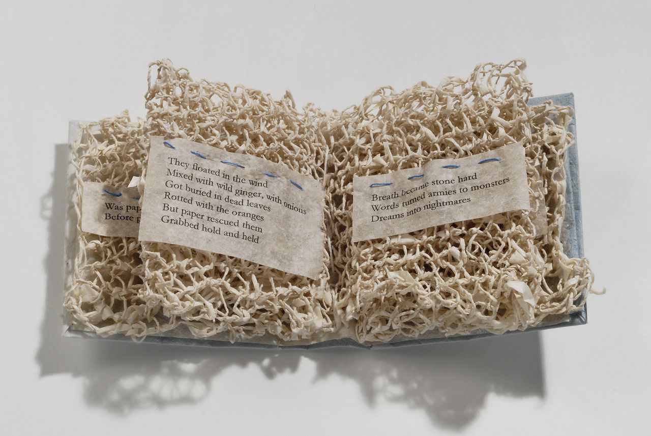 Paper (2010). Inkjet print on hanji, lokta, indigo, thread, poem by Joana Varawa. 3.25 x 2.75 x 1.25”. Yale Haas Library Collection.