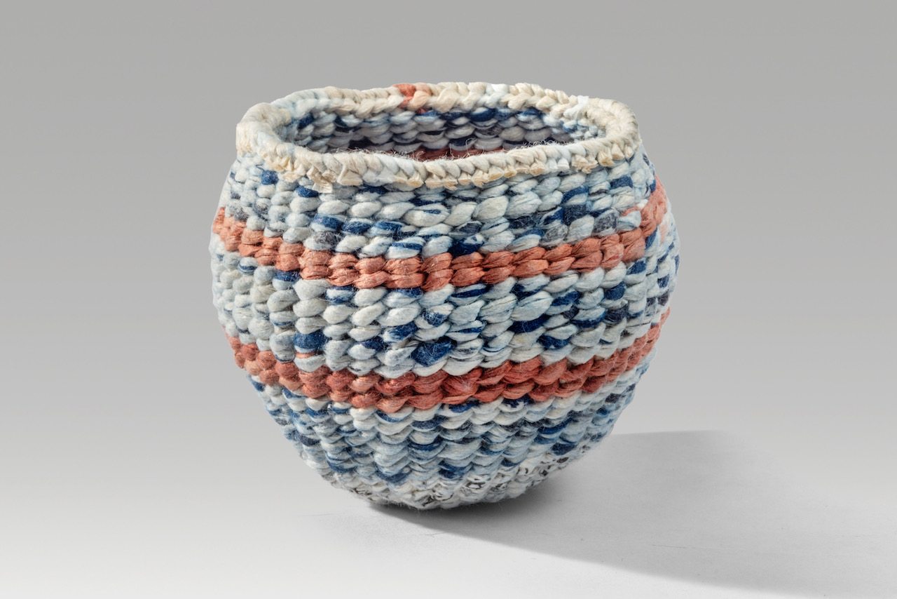 Waxed vessel (2020). Natural dyes and beeswax on corded and twined hanji. 2.5 x 2.75 x 2.75”.
