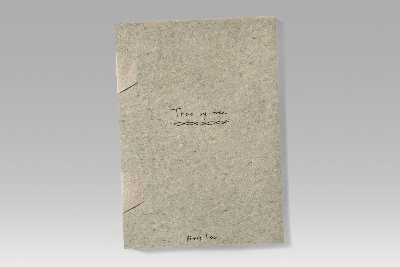 Tree by tree / green version (2025). Pen on handmade yucca-cotton-abaca paper. 5.6 x 7.8 x 0.3” closed, 11.25” wide open. 8 leaves; one of a kind.