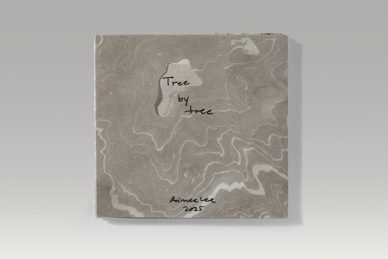 Tree by tree / accordion version (2025). Pen and suminagashi on paper. 3.9 x 4.1 x 0.25” closed, 24.9” wide open. One of a kind.