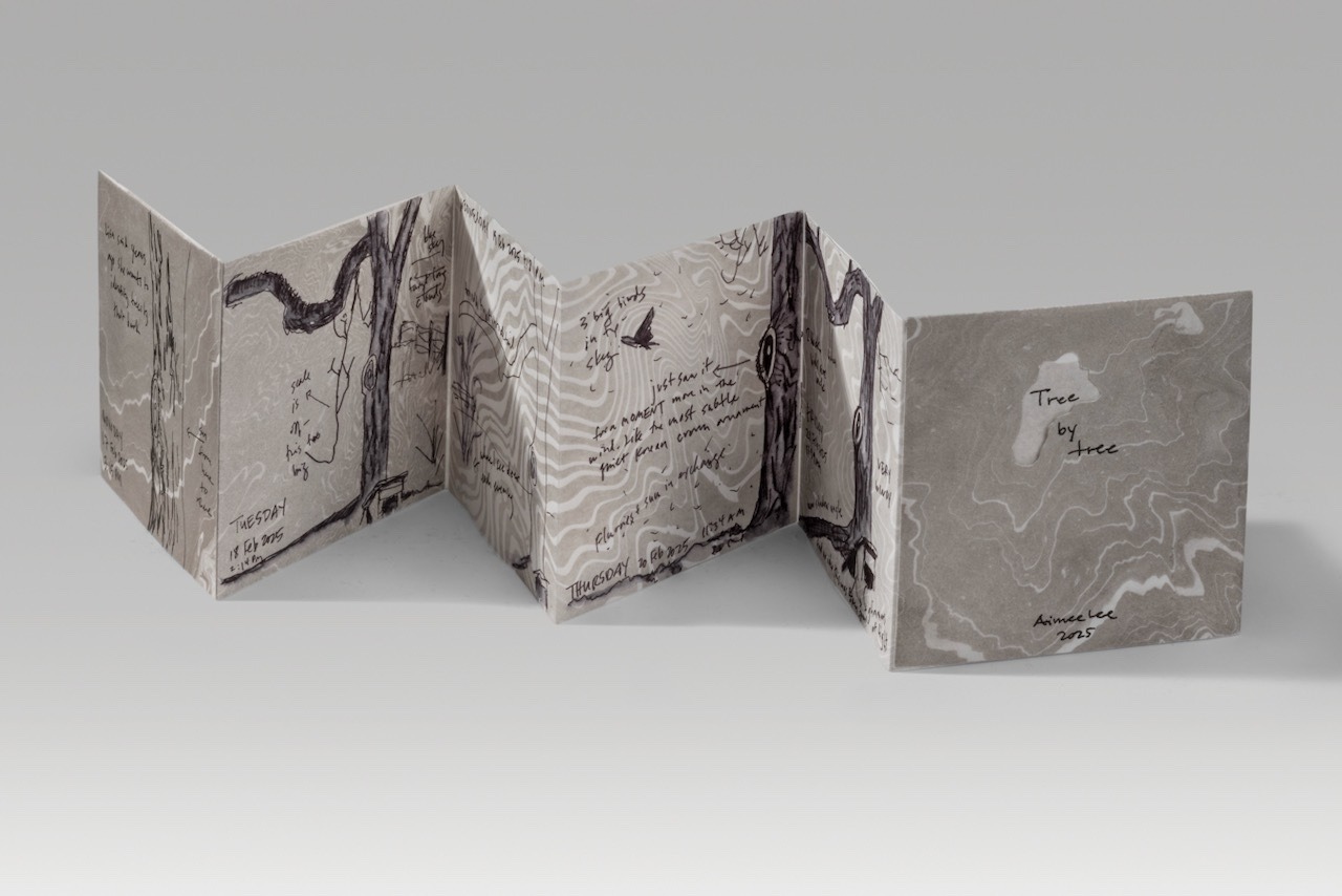 Tree by tree / accordion version (2025). Pen and suminagashi on paper. 3.9 x 4.1 x 0.25” closed, 24.9” wide open. One of a kind.