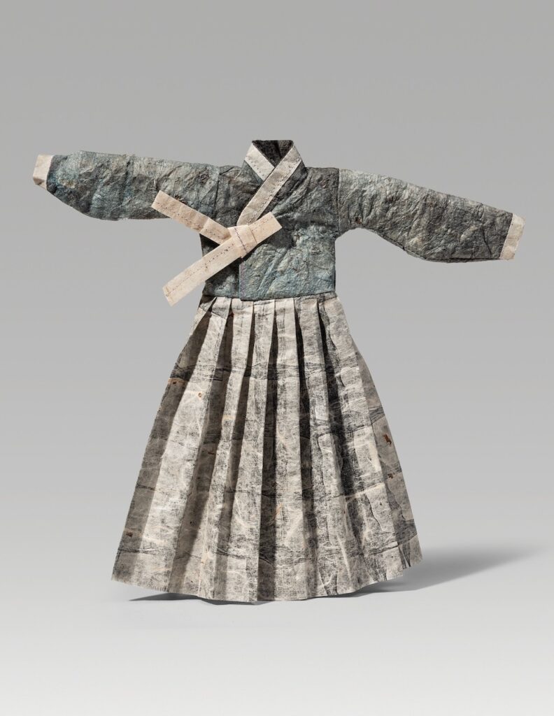 Shift (2025). Indigo and ink on hanji, thread. 10 x 10.5 x 1”.