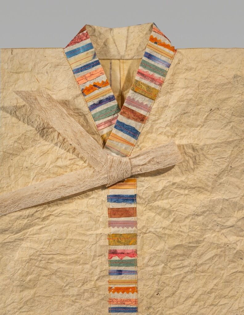 Intent (2026). Pen, ink, natural dye, thread on hanji, bark lace. 29 x 45.5”