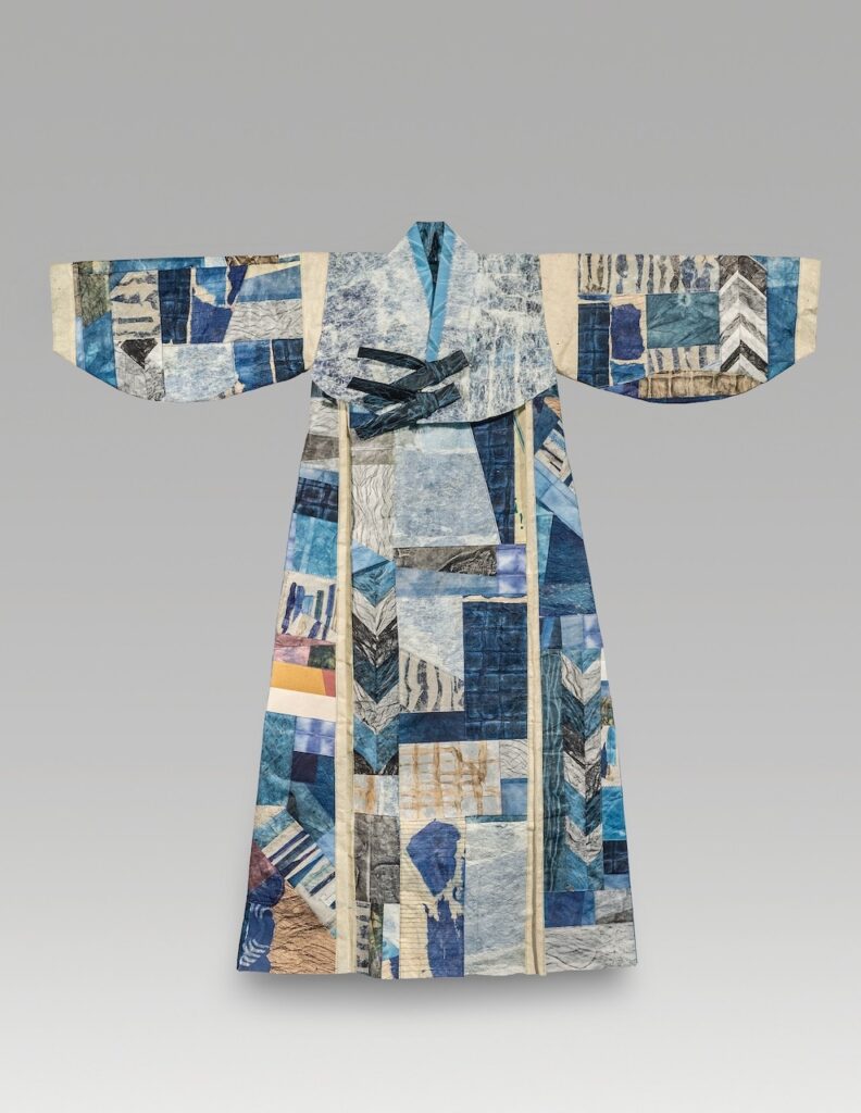 Ten from one (2026). Ink, dye, beeswax, paper, hanji, thread. 46 x 46.5”